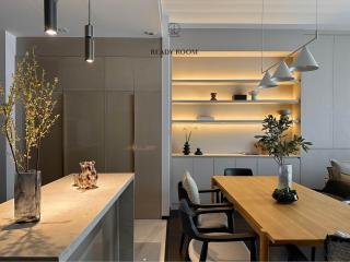 Modern kitchen with open shelving and dining area