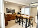 Modern kitchen with dining area and elegant finishes