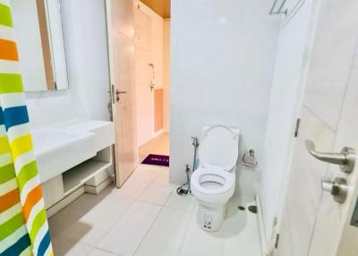 Bright modern bathroom with white interiors