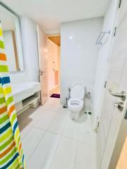 Bright modern bathroom with white interiors