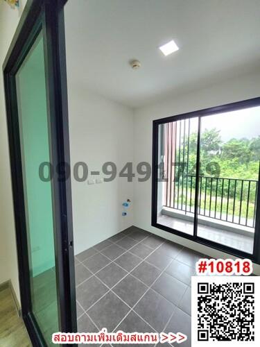 Empty room with large windows and tiled floor