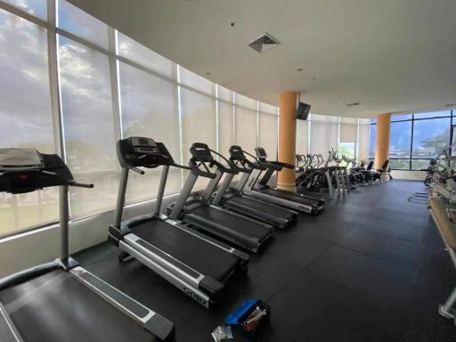 Spacious indoor gym with treadmills and large windows