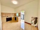 Modern kitchen with wooden cabinets and ample natural light