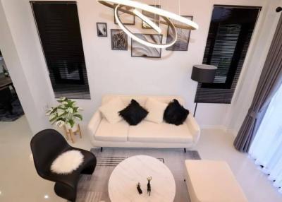 Modern living room with designer furniture and elegant lighting