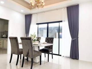 Elegant dining room with modern furniture and natural light