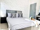 Elegantly designed modern bedroom with natural light