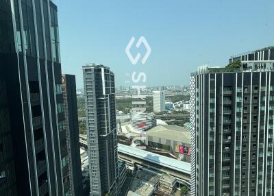 View from the building showing cityscape with multiple high-rise buildings