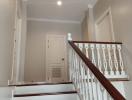 Elegant white staircase inside a residential home