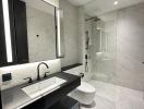 Modern bathroom with marble finish and walk-in shower