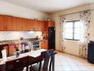 Spacious kitchen with modern appliances and ample cabinetry