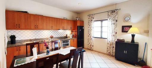 Spacious kitchen with modern appliances and ample cabinetry