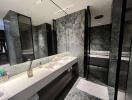 Modern marble bathroom with double vanity and glass shower
