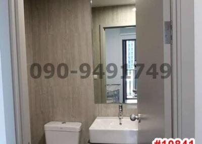 Modern bathroom interior with toilet and sink in a new apartment for sale