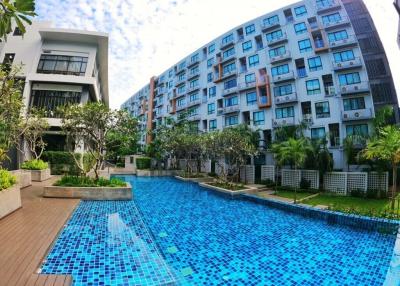 Modern apartment complex with swimming pool