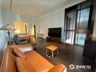 Spacious living room with modern furniture and natural light