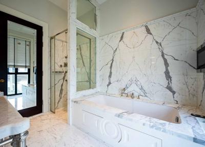 Luxurious Marble Bathroom with Vanity and Soaking Tub