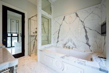 Luxurious Marble Bathroom with Vanity and Soaking Tub