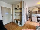 Compact living space with integrated kitchenette