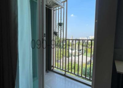 Compact balcony with an open view and glass door