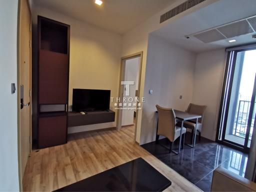 Modern living room interior with wooden floor and large window