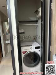 Compact Laundry Area with Washing Machine