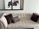 Modern living room with comfortable beige sofa and equestrian-themed wall art