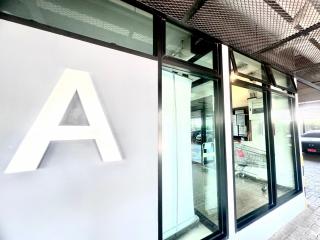 Exterior view of a modern building entrance with glass doors