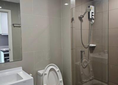 Modern bathroom with toilet and shower