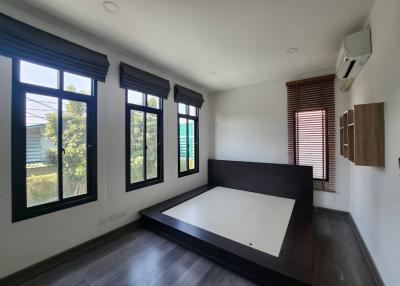 Spacious bedroom with ample natural light