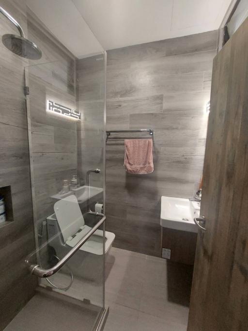 Modern bathroom with glass shower enclosure