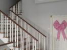 Elegant wooden staircase with white balusters inside a modern home