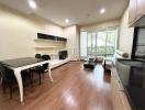 Modern kitchen with dining table set near window