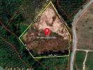 Aerial view of a triangular plot of land for sale