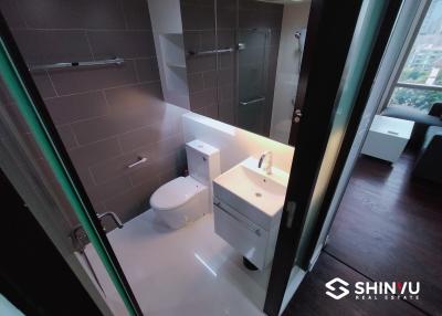 Modern bathroom interior with glass door shower and sleek design