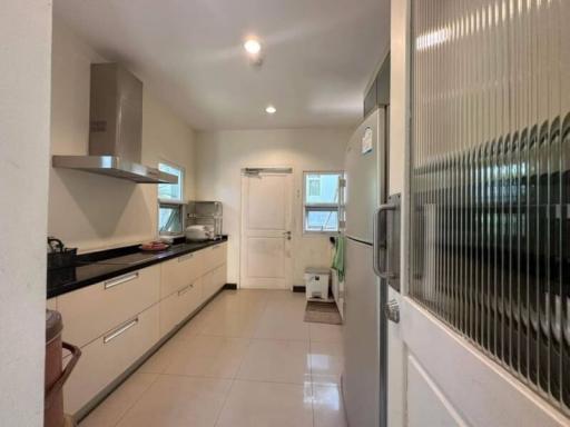 Modern kitchen with stainless steel appliances and ample cabinet space