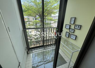 Balcony with railing and tree view