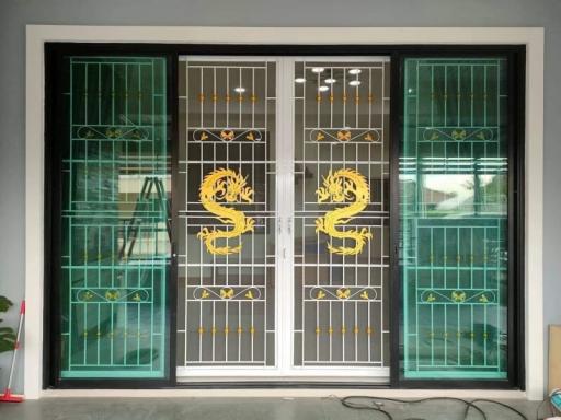 Elegant entrance doors with golden dragon design