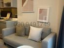 Cozy living room interior with a sofa and decorative wall art