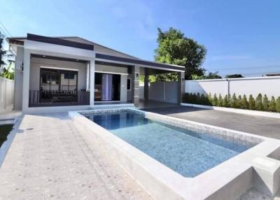 Modern house exterior with swimming pool