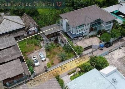 Aerial view of property exterior showing building and surrounding area