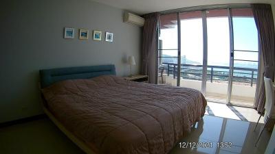 Bedroom with ocean view and balcony access