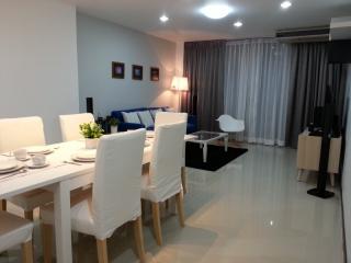 Spacious and modern living room with dining area