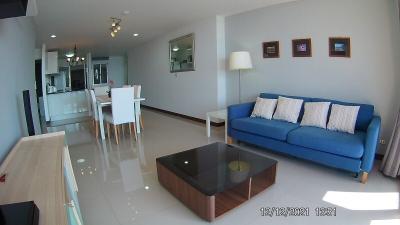 Spacious and modern living room with dining area and open kitchen