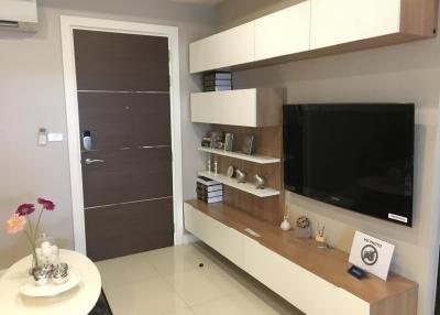Modern living room interior with television and decorative shelving