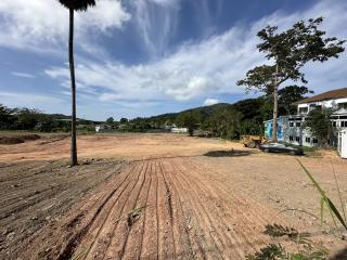 Spacious vacant land ready for development with clear skies and natural surroundings