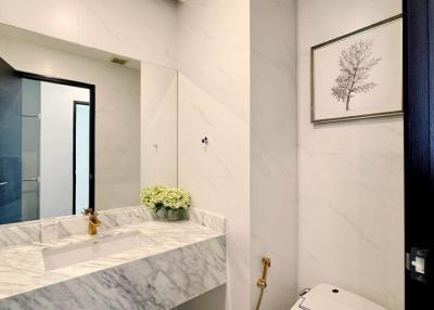 Contemporary bathroom interior with marble finishes