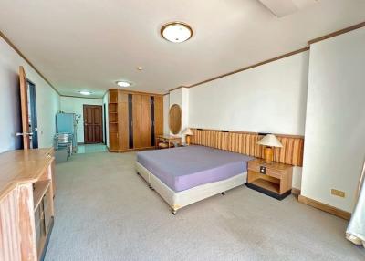 Spacious bedroom with ample natural light