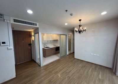 Spacious modern apartment interior with open plan kitchen