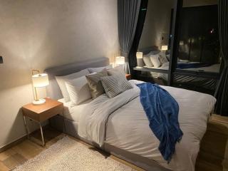 Cozy modern bedroom at night with ambient lighting