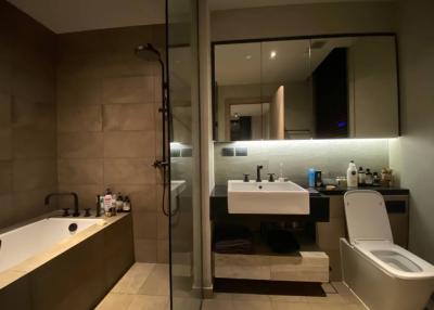 Modern bathroom interior with walk-in shower and bathtub